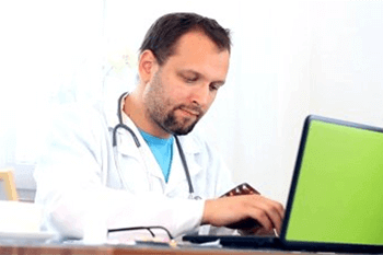 Doctor using computer